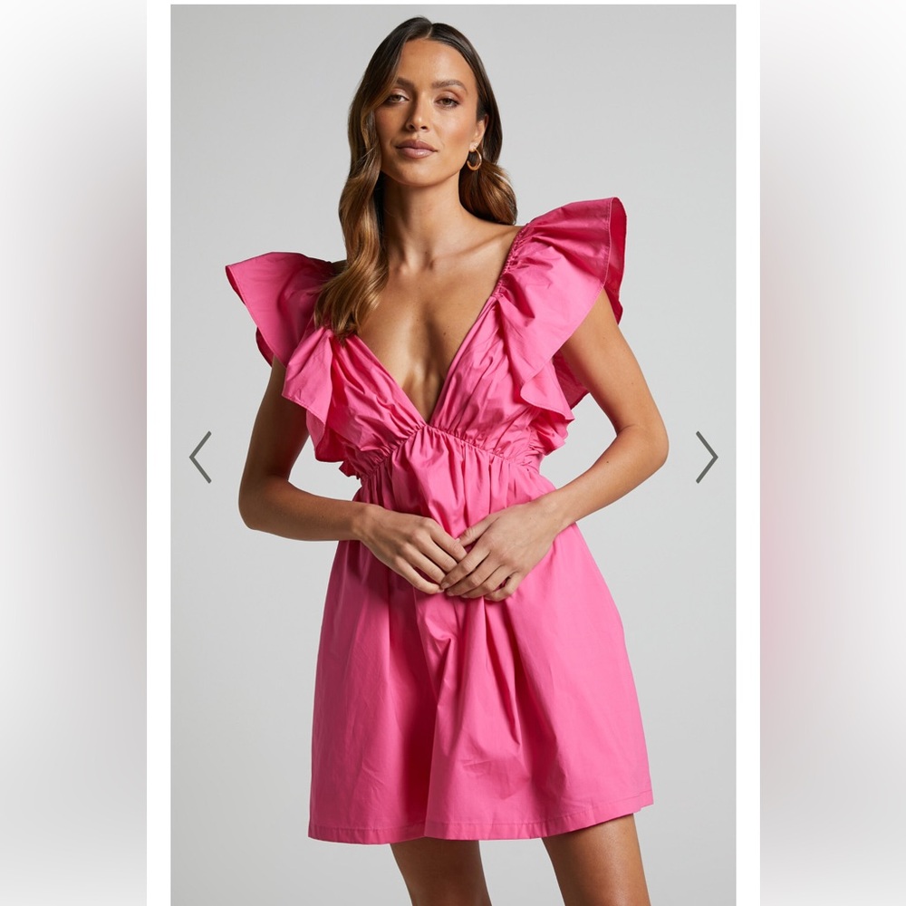 Showpo RAIZA MINI DRESS - RUFFLE SLEEVE TIE BACK PLUNGE DRESS IN FUCHSIA